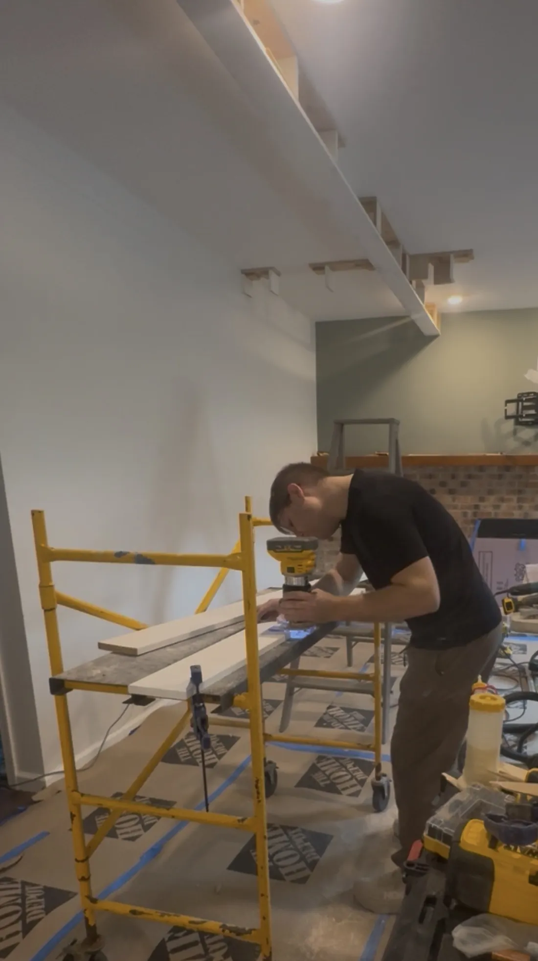 Routing a one-eighth-inch roundover detail along the bottom edge of a coffered ceiling beam