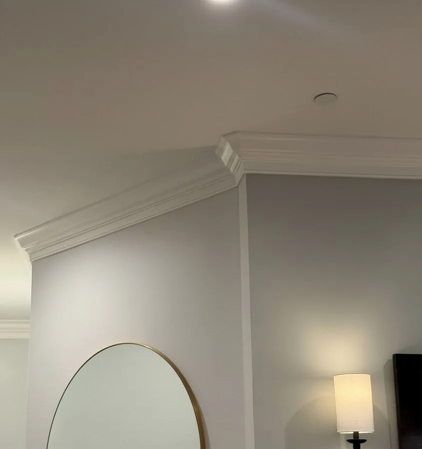 Two-piece crown molding detail with rounded corner by LM Legacy Remodeling, Main Line PA