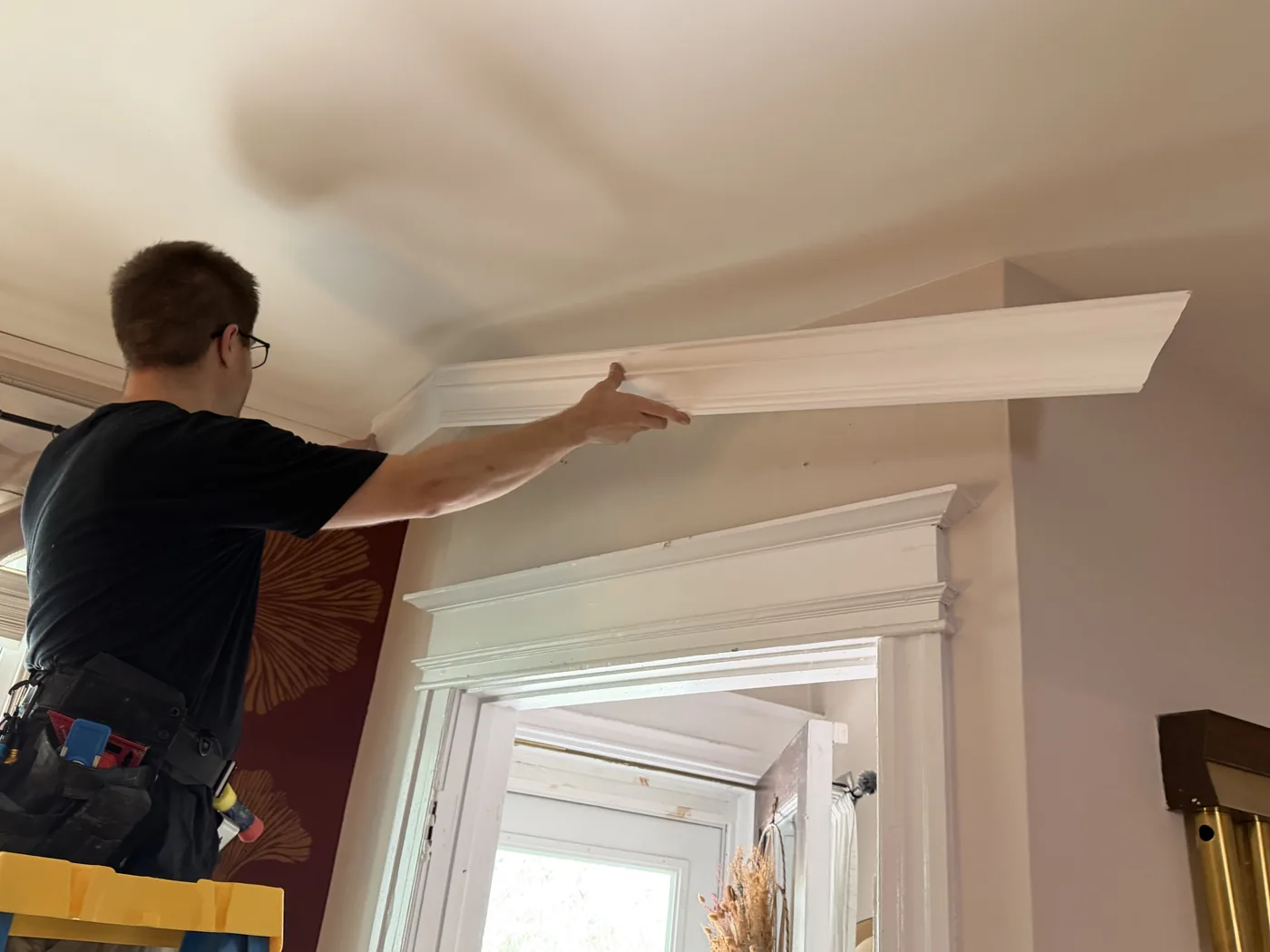 Installing a pre-assembled crown molding outside corner in a Philadelphia row home